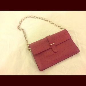 Small Furla clutch with chain